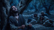 © PhotoGranary - Biblical scene of Jesus praying in the Garden of Gethsemane while disciples sleep in the background. The Messiah looks to heaven in agony with blood and sweat on his face before his arrest.
