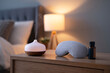 © Галя Дорожинська - Calming bedroom with a diffuser, sleep mask, and oils