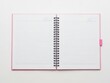 © SABANA - Open pink notebook with spiral binding