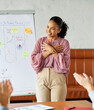 © Lumos sp - Group of young business people having a meeting or presentation and seminar with whiteboard in the office. Portrait of a young business woman