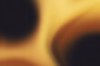 © Nubephoto - Golden amber and warm glow grainy gradient blur background. Cinematic luxury abstract background.