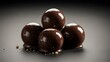 © PurePixels - Four glossy and perfectly spherical chocolate bonbons reflecting studio light. Chocolate covered peanut butter balls are a classic treat.