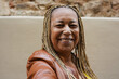 © Sabrina - Happy senior african woman doing selfie in the city - Travel, vacation and joyful elderly lifestyle concept