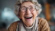 © Johannes - happy senior woman with joy excitement plays bingo in community smiles enjoys a fun social activity cheerful elderly lady in eyeglasses having fun happy retirement lifestyle