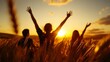© Sirichat. Camphol - Joyful celebration of life sunrise in a field group of friends natural environment silhouettes embracing freedom and happiness