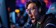 © Cherrin - Intense gamer focused on competition with headset and glasses.