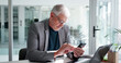 © peopleimages.com - Office, online and man with smartphone, texting and communication for investment opportunity on web. Business, wealth manager and mature person with mobile, online and chatting on social media app