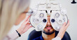 © Kobus L/peopleimages.com - Optometrist, client or man with phoropter for eye exam, vision test or determine prescription for clear sight. Assessment, optometry or people with lens selection machine, consultation or clinic