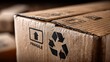© Trushchenko_O - A cardboard box with a fragile sticker on it. The box is brown and has a black arrow pointing up. The box is placed on a table