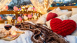 © Mikhail - Romantic setup for a cozy Valentine's Day celebration. Features wine glasses, heart-shaped decorations, and a warm blanket for a perfect date night.