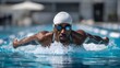 © Oleksandr - Male athlete swimming butterfly stroke in pool during professional training and competitive preparation
