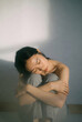 © 유다 마 - sad young woman sitting on the floor