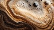 © nahid_hasan_masud - Close up of coffee foam bubbles and swirls