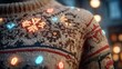 © Talha - A close-up of a festive Christmas jumper with a light-up motif,