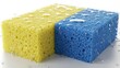 © VIRGHIANTI - Two wet rectangular sponges, one yellow and one blue, covered in water droplets on a white surface.