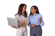 © Komora - Two business women collaborating, talking, and smiling while working together on a laptop with a transparent background