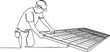 © Ananna - Continuous line drawing of a male worker installing solar panels for renewable energy