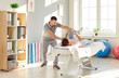 © Studio Romantic - Professional physiotherapist or chiropractor at work. Man doctor examining the leg of a female patient who is lying on a medical bed at the clinic. Physiotherapy concept