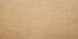 © AbstractAI - Jute hessian sackcloth woven burlap texture background in yellow beige cream color used for packaging or textile backdrop