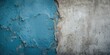 © vxnaghiyev - Peeling blue paint on rough concrete wall, urban decay background with weathered texture and cracked layers
