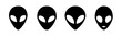 © Suriya - Four stylized alien heads with elongated shapes and distinctive eye placements in black and white