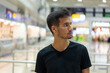 © Jasmin Merdan - Portrait of traveler inside airport. High quality photo