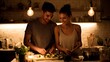 © irawan - Couple cooking together in a warm kitchen under pendant lights.