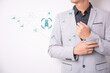 © shirophoto - The illustration shows a business icon showing the growth of a business using AI robots with a male businessman in the background.