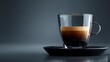 © Zaheer - Glass demitasse filled with espresso, surface crema illuminated by soft spotlight. Resting on glossy reflective black base. Background dissolves