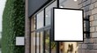 © MindRender - Blank square sign mockup on a brick wall of a modern building, perfect for branding and advertising display