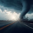© RosiDinda - Huge powerful tornado approaching highway debris flying severe weather crisis