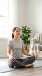 © Marlon - Serene woman practices mindfulness meditation at home, finding inner peace and balance in a bright, calming space perfect for promoting wellness