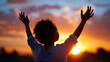 © Nataliya - Refugee child silhouette at sunset, raised hands in worship, hope and freedom representation, faith and praise symbolism, with copy space