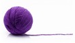 © Paul - a ball of purple yarn with a long thread isolated on white background