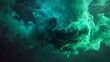 © Shehlla Saeed - Emerald green ink swirling underwater creating an ethereal and mesmerizing abstract composition