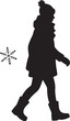 © Masud - A black and white icon of a person in a winter coat and hat walking through falling snowflakes on a cold day