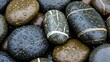 © supra - Wet zen stones with gold accents and water droplets