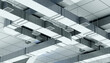 © Grispb - HVAC engineering installs suspended ventilation ducts and air distribution systems in a commercial building. Climate control, air conditioning design and mechanical infrastructure planning.