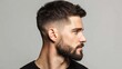 © Sawyer0 - A handsome young man with a modern fade haircut and beard showcases professional grooming, style, and contemporary male elegance.
