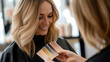 © photo for everything - A stylish woman at a hair salon chooses from a range of hair colors, getting ready for a fresh new look. The stylist is there to provide assistance and expertise!