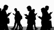© Reza - Silhouettes of people engrossed in their smartphones while walking.