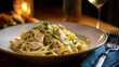 © ForYou IMAGES - Gourmet Chicken Fettuccine Alfredo, rich cream sauce pasta dinner served on a plate in a fine dining restaurant, illuminated by warm bokeh lights.