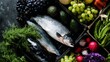 © Juan - Fresh fish and vegetables arranged on dark background for gourmet food branding photography concept