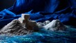 © Juan - Blocks of salt soap on snowy textured surface with dramatic blue fabric background in spa scene