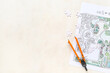© Pixel-Shot - Zoning plan with puzzle pieces and pair of compasses on white grunge background