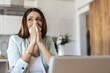 © Jelena Stanojkovic - Remote work from home, sneeze and woman with a laptop, sick and illness with fatigue. Female person, freelancer or entrepreneur blowing her nose, virus and flu with online consultation with allergies.