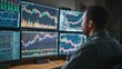 © Justlight - Medium shot of a financial analyst examining charts and graphs on multiple screens to predict commodity price trends using technical indicators.