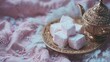 © Gulnaz - A tray of pink pastries sits on a table next to a gold tea pot