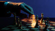 © master1305 - Hand moving glowing golden chess king across board. Concept of premium business strategy, gambling psychology, leadership control, risk driven decisions and competitive planning.