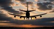 © XT Dabro - Rear view of a large commercial airplane landing or taking off on a runway at sunset, silhouetted against a dramatic cloudy sky, symbolizing air travel and transportation